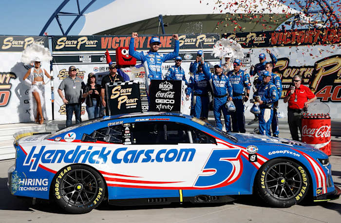 Kyle Larson and the No. 5 Hendrick Motorsports team celebrate in victory lane after Larson won Sunday's NASCAR Cup playoff race at Las Vegas, giving him an automatic berth into the Championship 4 round. (Photo by Chris Graythen/Getty Images)